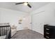 Cozy Bedroom with a comfortable glider, dark dresser, and ample closet space for storage at 4238 E Mitchell Dr, Phoenix, AZ 85018