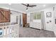 Playful room with barn doors, large dresser, and cozy reading nook for relaxation and play at 4238 E Mitchell Dr, Phoenix, AZ 85018