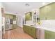 Modern kitchen with updated appliances, beautiful cabinetry, and sleek countertops at 4238 E Mitchell Dr, Phoenix, AZ 85018