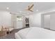 Spacious bedroom with a ceiling fan, lots of natural light, and neutral decor at 4238 E Mitchell Dr, Phoenix, AZ 85018