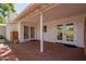 Inviting outdoor patio area with brick flooring, perfect for relaxing and entertaining at 4238 E Mitchell Dr, Phoenix, AZ 85018