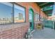 Balcony with a small bistro set offers cityscape views, creating an intimate outdoor dining or relaxation area at 424 S 2Nd St # 203, Phoenix, AZ 85004