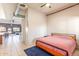 Cozy bedroom with a neutral color scheme, and natural light with door to outside at 424 S 2Nd St # 203, Phoenix, AZ 85004