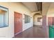 Hallway with unit 203 entrance, smooth flooring, and ambient lighting, creating a secure and comfortable access point at 424 S 2Nd St # 203, Phoenix, AZ 85004