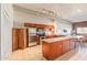Open kitchen with stainless steel appliances, and large counter for food prep or entertaining at 424 S 2Nd St # 203, Phoenix, AZ 85004