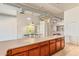 Spacious open kitchen area with an island that has seating and stainless steel appliances at 424 S 2Nd St # 203, Phoenix, AZ 85004