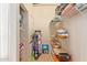 Organized walk-in closet with adjustable shelving provides ample storage at 424 S 2Nd St # 203, Phoenix, AZ 85004