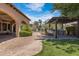 Outdoor kitchen and patio area, perfect for entertaining, with seating, a firepit, and an outdoor grill at 4327 E Capricorn Pl, Chandler, AZ 85249