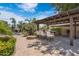 Inviting backyard with an outdoor kitchen, a fire pit, and poolside seating at 4327 E Capricorn Pl, Chandler, AZ 85249