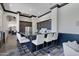 Stylish bar area with a modern countertop, pendant lights, and seating for five at 4327 E Capricorn Pl, Chandler, AZ 85249