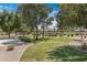 Well-manicured green space and landscaped common area with trees at 4327 E Capricorn Pl, Chandler, AZ 85249