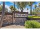 Stone community welcome sign showcasing the name 'Vasaro' with beautiful landscaping at 4327 E Capricorn Pl, Chandler, AZ 85249