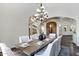 Dining room features an ornate chandelier and seating for eight at 4327 E Capricorn Pl, Chandler, AZ 85249