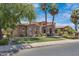 Beautiful single-Gathering home featuring a manicured lawn, desert landscaping, and a stunning stone facade at 4327 E Capricorn Pl, Chandler, AZ 85249