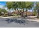 Attractive single Gathering home with lush landscaping, mature trees, and a three car garage at 4327 E Capricorn Pl, Chandler, AZ 85249