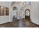 Grand foyer features beautiful tile flooring, arched doorways, and decorative lighting at 4327 E Capricorn Pl, Chandler, AZ 85249