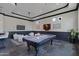 Recreation room with a pool table, TV area, and accent lighting, offering entertainment and relaxation at 4327 E Capricorn Pl, Chandler, AZ 85249