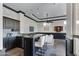 Entertaining area with wet bar, pendant lighting, and comfortable seating at 4327 E Capricorn Pl, Chandler, AZ 85249