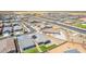 Bird's eye view of a gray-roofed house with solar panels and fenced yard in a new suburban development at 4371 E Enmark Dr, San Tan Valley, AZ 85143