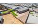 Real estate aerial showcasing a private putting green, desert landscaping and backyard privacy fence at 4371 E Enmark Dr, San Tan Valley, AZ 85143