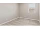 Neutral bedroom with a window overlooking the property at 4371 E Enmark Dr, San Tan Valley, AZ 85143