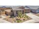 Beautifully landscaped front yard enhances the curb appeal of this lovely home at 4371 E Enmark Dr, San Tan Valley, AZ 85143