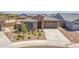 Charming single-Gathering home with well-maintained landscaping and a two-car garage at 4371 E Enmark Dr, San Tan Valley, AZ 85143