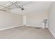 Spacious garage with concrete floors, water heater, and garage door opener at 4371 E Enmark Dr, San Tan Valley, AZ 85143