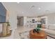 Bright, open concept living room with a view of the kitchen and modern furnishings at 4371 E Enmark Dr, San Tan Valley, AZ 85143