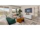 Inviting living room with neutral tones, comfortable seating, and stylish decor at 4371 E Enmark Dr, San Tan Valley, AZ 85143