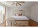 The bedroom is bathed in natural light and has a ceiling fan to provide a comfortable climate at 4419 W Vogel Ave, Glendale, AZ 85302