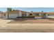 Charming single-story home featuring a low-maintenance desert landscape and attached two-car garage at 4419 W Vogel Ave, Glendale, AZ 85302