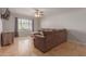 Bright living room with tile flooring, a large window, and comfortable, inviting furniture at 4419 W Vogel Ave, Glendale, AZ 85302