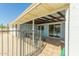 Covered patio adjacent to a pool area with outdoor furniture and lighting perfect for entertaining at 4419 W Vogel Ave, Glendale, AZ 85302