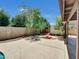 Concrete patio and block wall in backyard at 4509 E Joan De Arc Ave, Phoenix, AZ 85032