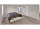 Bedroom with neutral carpet and an open doorway at 4509 E Joan De Arc Ave, Phoenix, AZ 85032