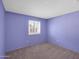 Empty bedroom featuring carpet floors, a window, and painted walls at 4509 E Joan De Arc Ave, Phoenix, AZ 85032