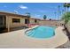 A private backyard pool offers a refreshing escape with desert landscaping and a covered patio area at 4509 E Joan De Arc Ave, Phoenix, AZ 85032