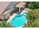 Inviting backyard featuring a private pool, covered patio and low-maintenance landscaping at 45131 W Horse Mesa Rd, Maricopa, AZ 85139