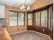 Bright dining room with large windows, and neutral paint at 45131 W Horse Mesa Rd, Maricopa, AZ 85139