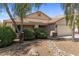 Charming single-story home with well-manicured front yard and desert landscaping at 45131 W Horse Mesa Rd, Maricopa, AZ 85139