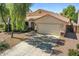 Charming single-story home with a well-maintained front yard and two-car garage at 45131 W Horse Mesa Rd, Maricopa, AZ 85139