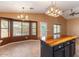 Bright kitchen with white cabinets and butcher block island at 45131 W Horse Mesa Rd, Maricopa, AZ 85139
