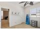 Bedroom with a ceiling fan and plenty of wall space for storage and shelving options at 46141 W Rainbow Dr, Maricopa, AZ 85139