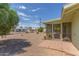 Backyard features a gravel ground cover, and an enclosed patio at 5309 E Butte St, Mesa, AZ 85205