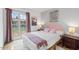 Cozy bedroom with a large window offering a view of the backyard at 5343 W Vogel Ave, Glendale, AZ 85302