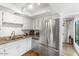 Bright kitchen with stainless steel appliances and granite countertops offer a modern feel at 5343 W Vogel Ave, Glendale, AZ 85302