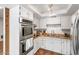 Bright kitchen features stainless steel appliances and modern cabinetry at 5343 W Vogel Ave, Glendale, AZ 85302
