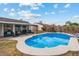Sparkling in-ground pool surrounded by lush landscaping is ready for Summer at 5343 W Vogel Ave, Glendale, AZ 85302