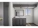 Bathroom featuring a vanity, large mirror and open door to shower at 53925 W Stallion Rd, Maricopa, AZ 85139